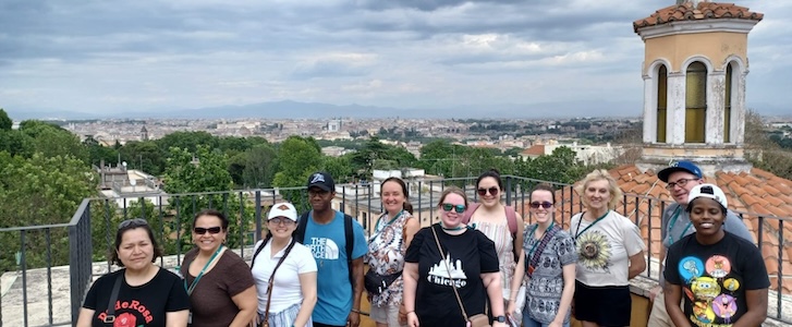 Honors students standing on rooftop in Rome
